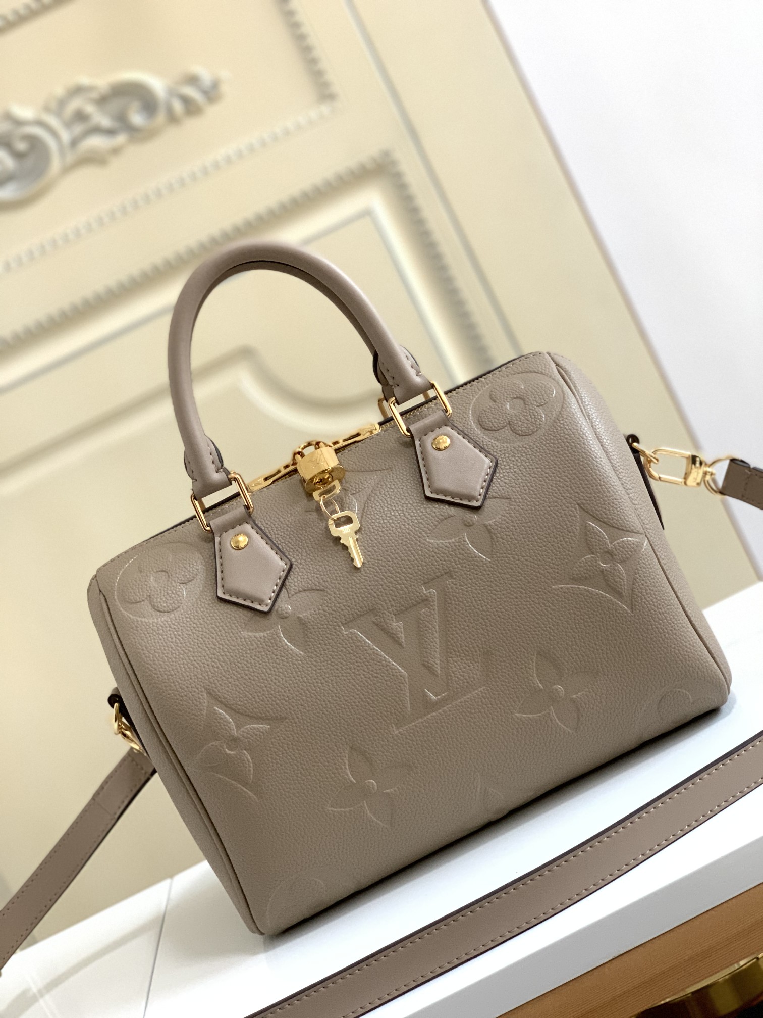 Speedy Bandoulière 25 Monogram Empreinte Leather Turtledove M59273