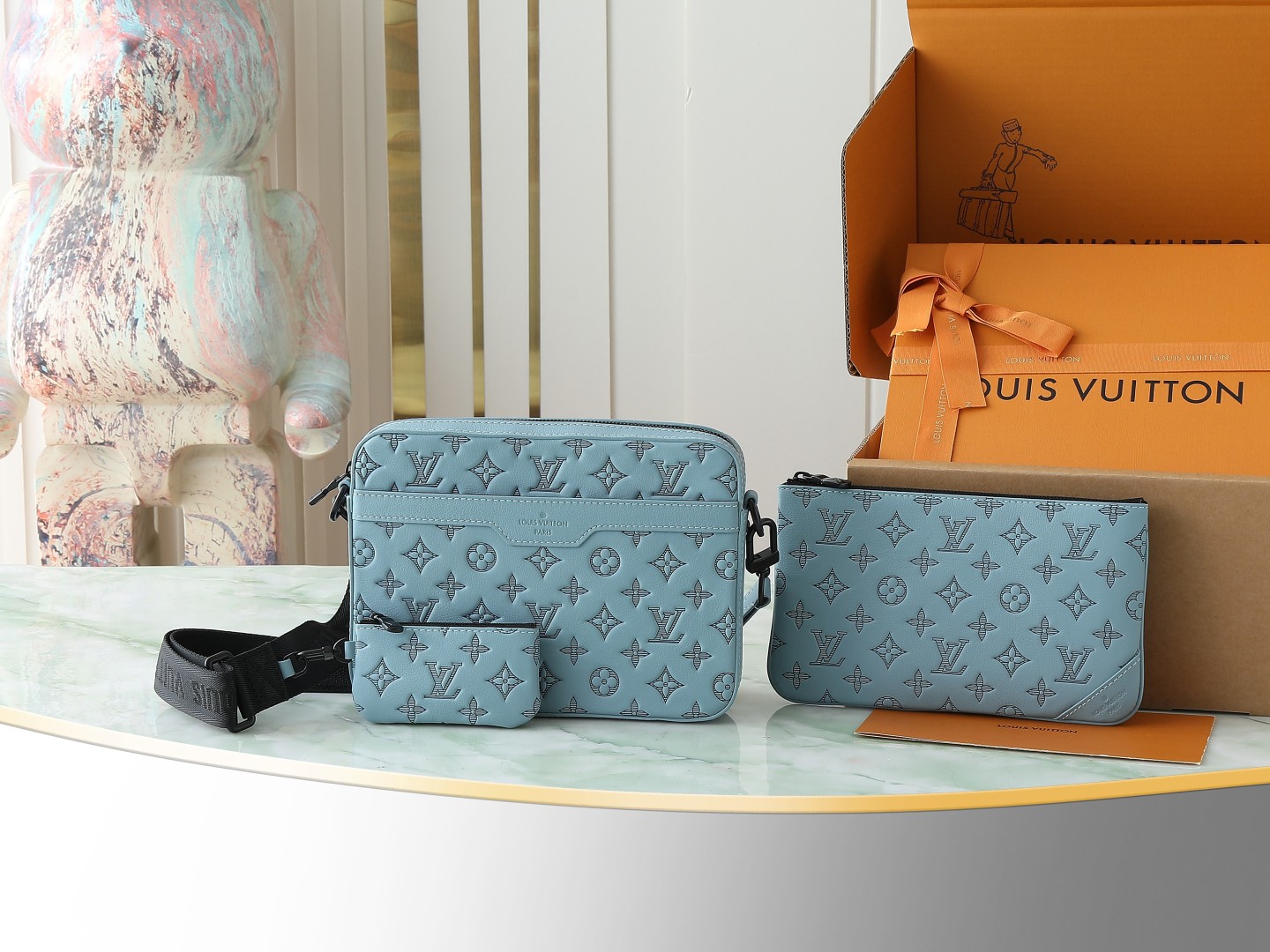 Trio Messenger Bag G65 Sky Blue Monogram Shadow M14781